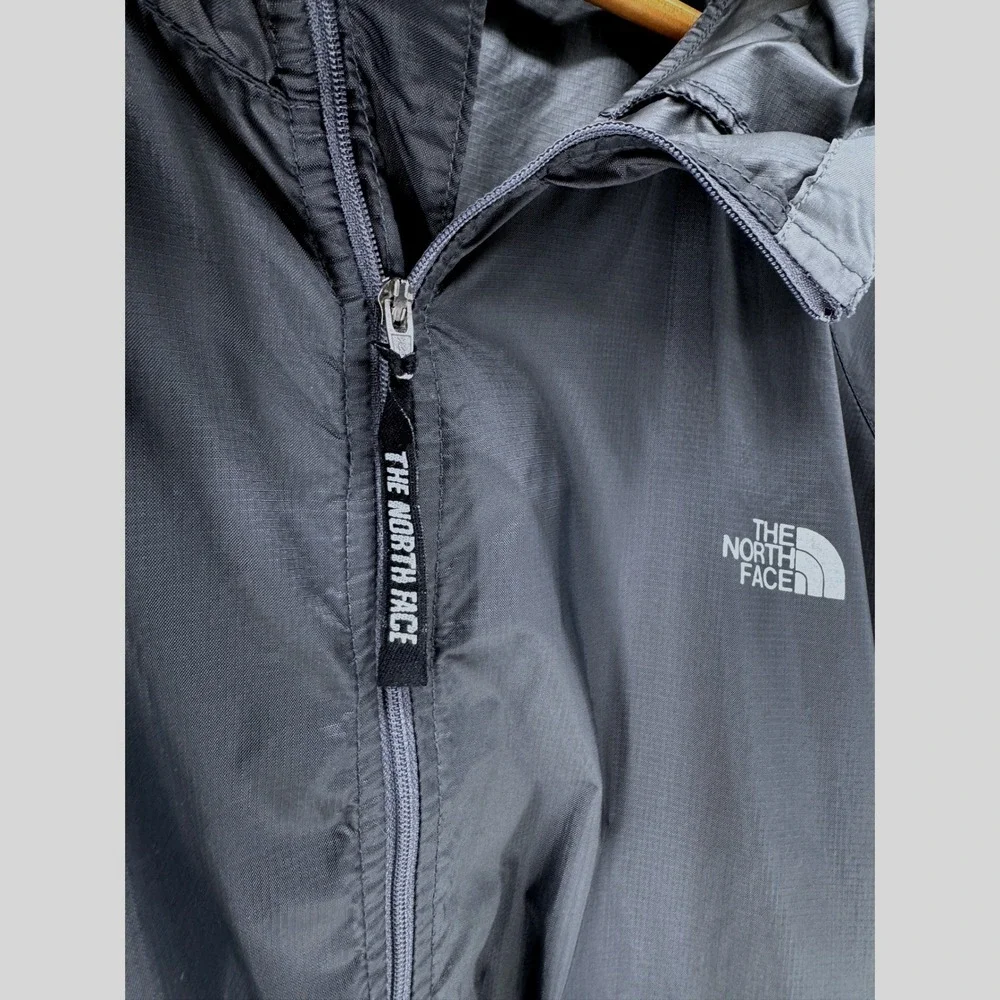 The North Face Windbreaker Jacket Mens XL Gray Hooded Full Zip Stow Pocket